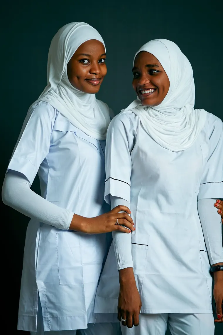 Professional nurses in modest uniform